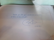 You may recall that President Obama visited here last fall. Photos and other memorabilia from that visit, like this autograph in the visitors' book, are on prominent display.
